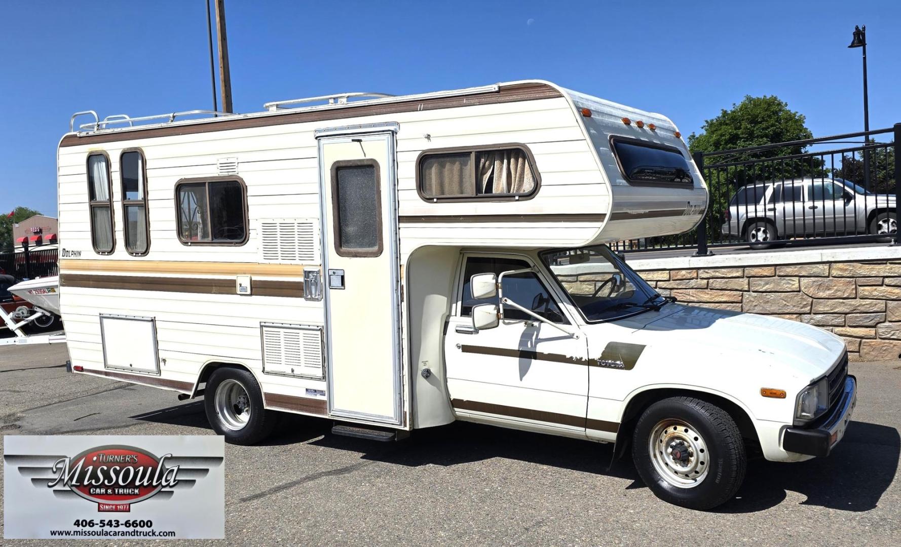 1983 White /Brown Toyota Pickup Dolphin (JT5RN44D9D1) with an 2.4L L4 SOHC 8V engine, 4 Speed Manual transmission, located at 450 N Russell, Missoula, MT, 59801, (406) 543-6600, 46.874496, -114.017433 - Hard to find Dolphin Class C Motorhome on Toyota Frame. Only 47,000 Miles. 2.4L I4 Engine. 4 Speed Manual Transmission. The hot water heater has been bypassed so it doesn't work. Heater, Stove and Fridge seem fine. The bathroom needs new wallpaper. Obviously it's a older motorhome so it's not perfec - Photo#0