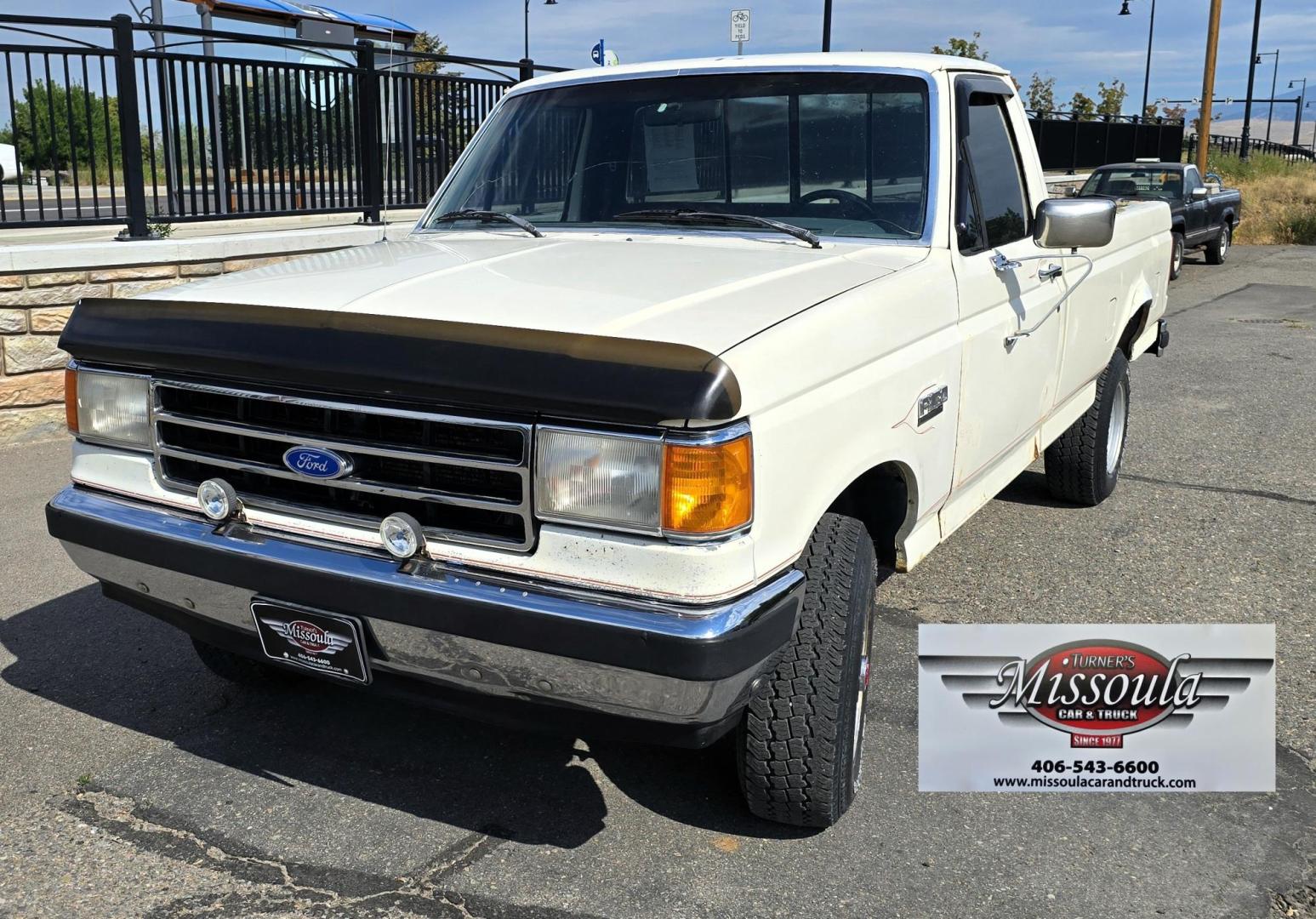 1989 White /Black Ford F-150 Reg. Cab Long Bed 4WD (1FTEF14Y0KP) with an 4.9L L6 OHV 12V engine, 4-Speed Automatic Overdrive transmission, located at 450 N Russell, Missoula, MT, 59801, (406) 543-6600, 46.874496, -114.017433 - Photo#2