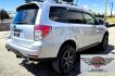 2012 Silver /Black Subaru Forester 2.5XT Touring (JF2SHGGC1CH) with an 2.5L H4 SOHC 16V engine, 4-Speed Automatic transmission, located at 450 N Russell, Missoula, MT, 59801, (406) 543-6600, 46.874496, -114.017433 - Beefy Subaru Forester with 2.5XT Turbo Engine that was installed only 3,000 miles ago. Comes with Cobb Tuner. Has New Axles and Suspension. Automatic Transmission. Power Sunroof. AM FM SAT CD Bluetooth. Backup Camera. Air. Cruise. Tilt. Power Windows and Locks. Remote Start. Heated Leather Seats. Th - Photo#3