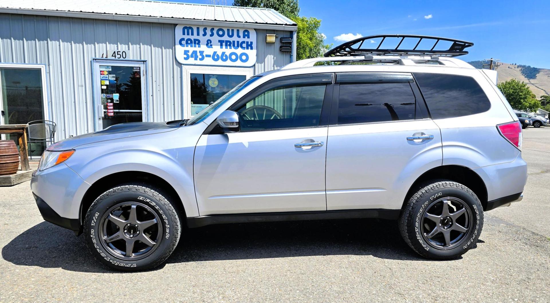 2012 Silver /Black Subaru Forester 2.5XT Touring (JF2SHGGC1CH) with an 2.5L H4 SOHC 16V engine, 4-Speed Automatic transmission, located at 450 N Russell, Missoula, MT, 59801, (406) 543-6600, 46.874496, -114.017433 - Beefy Subaru Forester with 2.5XT Turbo Engine that was installed only 3,000 miles ago. Comes with Cobb Tuner. Has New Axles and Suspension. Automatic Transmission. Power Sunroof. AM FM SAT CD Bluetooth. Backup Camera. Air. Cruise. Tilt. Power Windows and Locks. Remote Start. Heated Leather Seats. Th - Photo#5