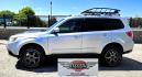 2012 Silver /Black Subaru Forester 2.5XT Touring (JF2SHGGC1CH) with an 2.5L H4 SOHC 16V engine, 4-Speed Automatic transmission, located at 450 N Russell, Missoula, MT, 59801, (406) 543-6600, 46.874496, -114.017433 - Beefy Subaru Forester with 2.5XT Turbo Engine that was installed only 3,000 miles ago. Comes with Cobb Tuner. Has New Axles and Suspension. Automatic Transmission. Power Sunroof. AM FM SAT CD Bluetooth. Backup Camera. Air. Cruise. Tilt. Power Windows and Locks. Remote Start. Heated Leather Seats. Th - Photo#1