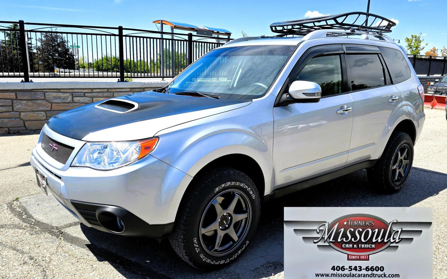 2012 Silver /Black Subaru Forester 2.5XT Touring (JF2SHGGC1CH) with an 2.5L H4 SOHC 16V engine, 4-Speed Automatic transmission, located at 450 N Russell, Missoula, MT, 59801, (406) 543-6600, 46.874496, -114.017433 - Beefy Subaru Forester with 2.5XT Turbo Engine that was installed only 3,000 miles ago. Comes with Cobb Tuner. Has New Axles and Suspension. Automatic Transmission. Power Sunroof. AM FM SAT CD Bluetooth. Backup Camera. Air. Cruise. Tilt. Power Windows and Locks. Remote Start. Heated Leather Seats. Th - Photo#4