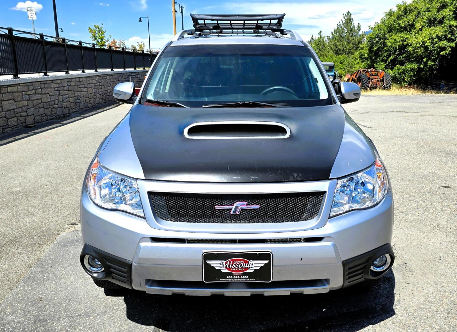 2012 Silver /Black Subaru Forester 2.5XT Touring (JF2SHGGC1CH) with an 2.5L H4 SOHC 16V engine, 4-Speed Automatic transmission, located at 450 N Russell, Missoula, MT, 59801, (406) 543-6600, 46.874496, -114.017433 - Beefy Subaru Forester with 2.5XT Turbo Engine that was installed only 3,000 miles ago. Comes with Cobb Tuner. Has New Axles and Suspension. Automatic Transmission. Power Sunroof. AM FM SAT CD Bluetooth. Backup Camera. Air. Cruise. Tilt. Power Windows and Locks. Remote Start. Heated Leather Seats. Th - Photo#7