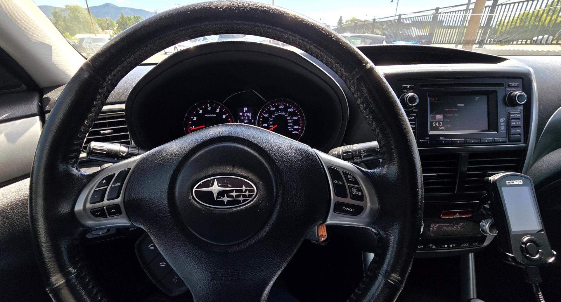 2012 Silver /Black Subaru Forester 2.5XT Touring (JF2SHGGC1CH) with an 2.5L H4 SOHC 16V engine, 4-Speed Automatic transmission, located at 450 N Russell, Missoula, MT, 59801, (406) 543-6600, 46.874496, -114.017433 - Beefy Subaru Forester with 2.5XT Turbo Engine that was installed only 3,000 miles ago. Comes with Cobb Tuner. Has New Axles and Suspension. Automatic Transmission. Power Sunroof. AM FM SAT CD Bluetooth. Backup Camera. Air. Cruise. Tilt. Power Windows and Locks. Remote Start. Heated Leather Seats. Th - Photo#15