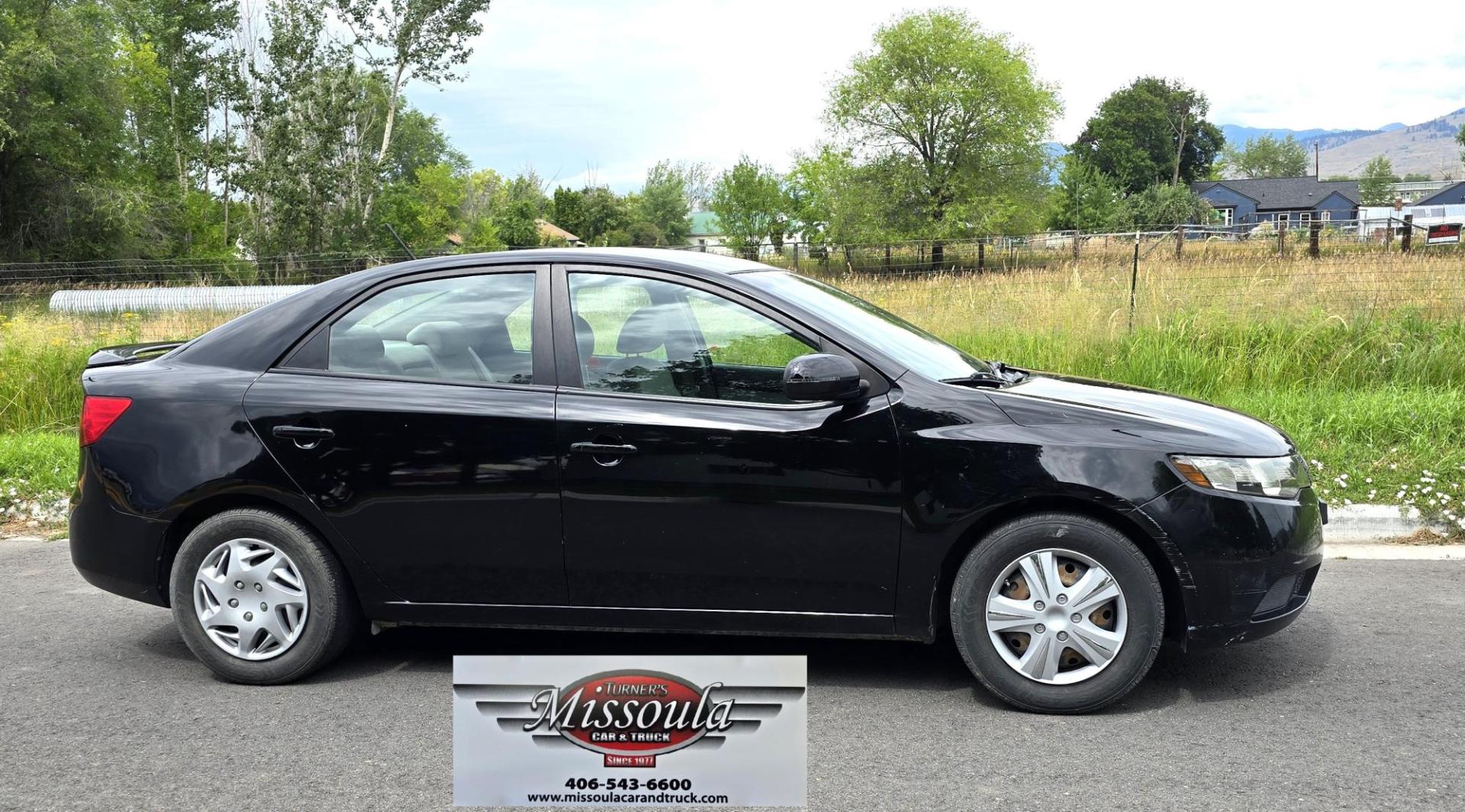 2012 Black /Tan Kia Forte EX (KNAFU4A24C5) with an 2.0L L4 DOHC 16V engine, Automatic transmission, located at 450 N Russell, Missoula, MT, 59801, (406) 543-6600, 46.874496, -114.017433 - Photo#0