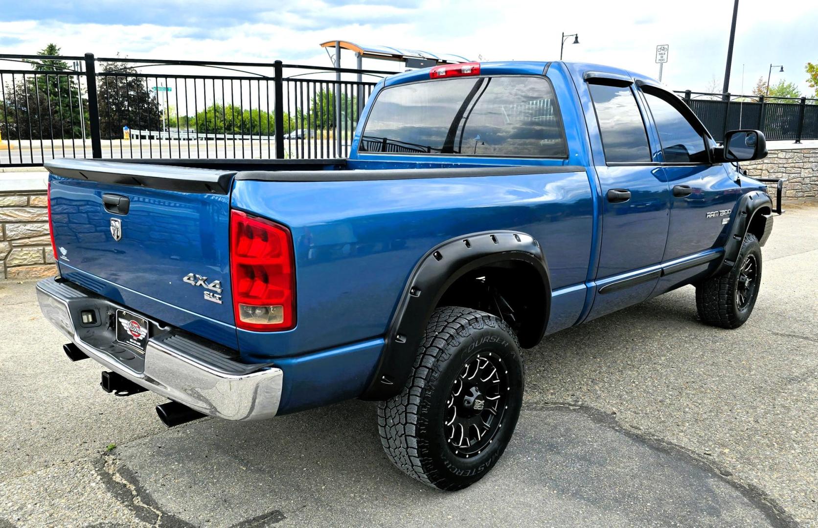 2006 Blue /Gray Dodge Ram 1500 SLT Quad Cab 4WD (1D7HU18246S) with an 5.7L V8 OHV 16V engine, 5-Speed Automatic Overdrive transmission, located at 450 N Russell, Missoula, MT, 59801, (406) 543-6600, 46.874496, -114.017433 - Beautiful 4WD Dodge with 5.7L Hemi. Automatic Transmission. Air. Cruise. Tilt. Hefty Grill Guard. AM FM CD Player. Power Drivers Seat. Power Windows and Locks. Towing. Nice Wheels and Tires. We Finance through local Credit Unions. We do NOT offer In House (Buy Here Pay Here) Financing. - Photo#2
