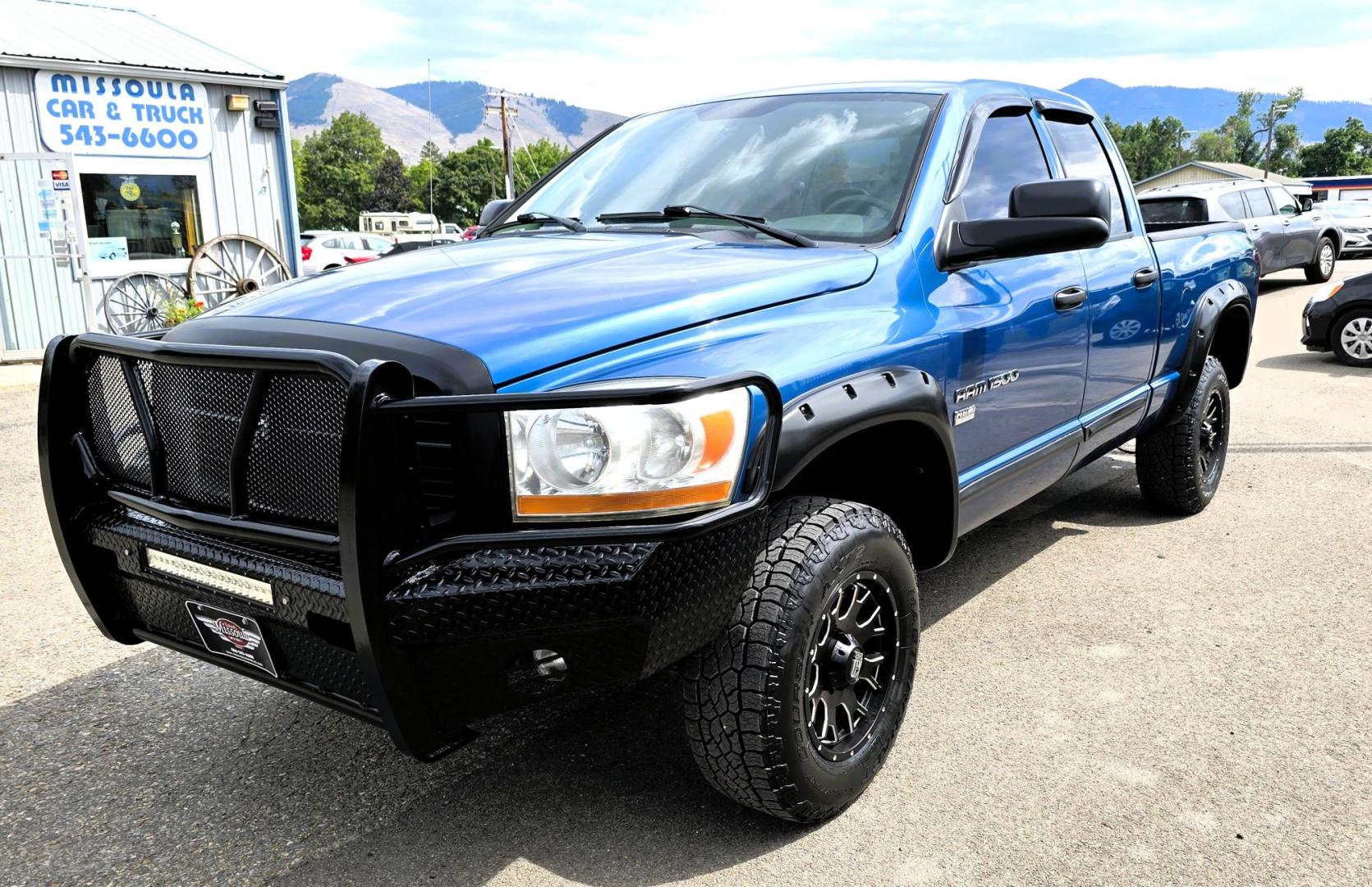 2006 Blue /Gray Dodge Ram 1500 SLT Quad Cab 4WD (1D7HU18246S) with an 5.7L V8 OHV 16V engine, 5-Speed Automatic Overdrive transmission, located at 450 N Russell, Missoula, MT, 59801, (406) 543-6600, 46.874496, -114.017433 - Beautiful 4WD Dodge with 5.7L Hemi. Automatic Transmission. Air. Cruise. Tilt. Hefty Grill Guard. AM FM CD Player. Power Drivers Seat. Power Windows and Locks. Towing. Nice Wheels and Tires. We Finance through local Credit Unions. We do NOT offer In House (Buy Here Pay Here) Financing. - Photo#7