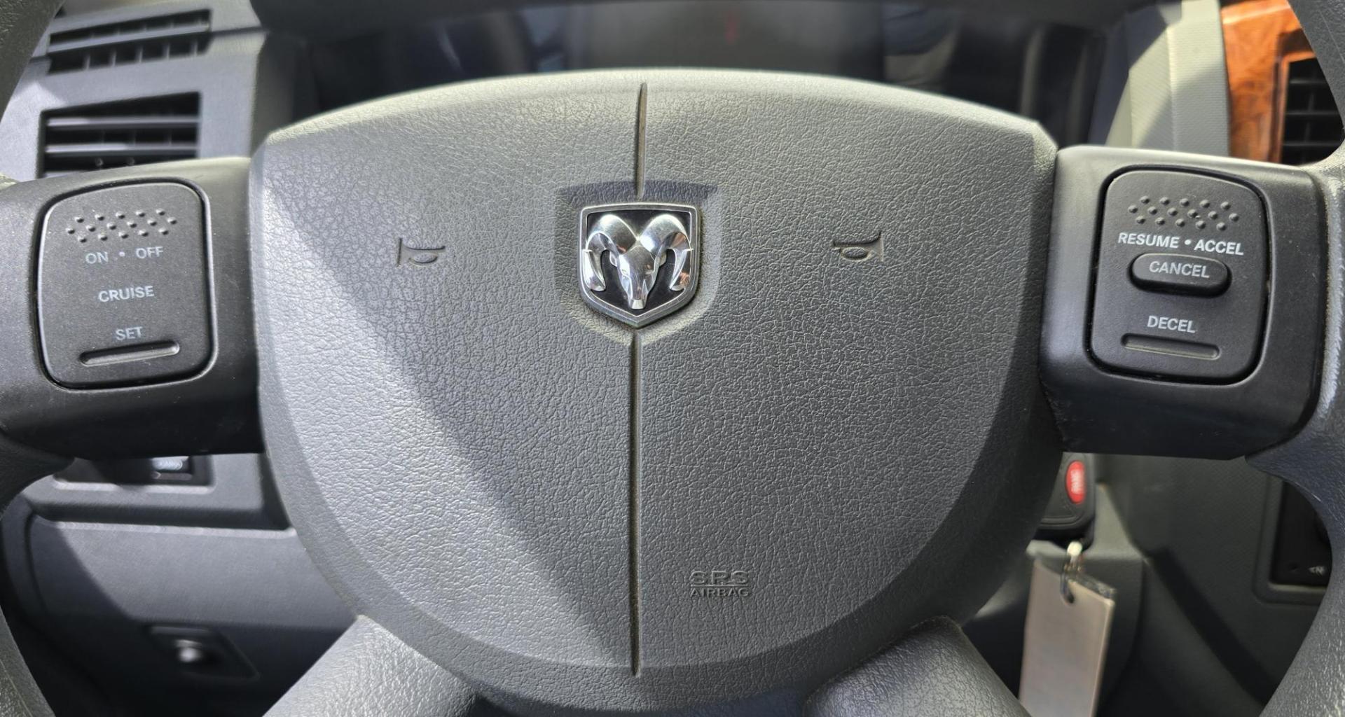 2006 Blue /Gray Dodge Ram 1500 SLT Quad Cab 4WD (1D7HU18246S) with an 5.7L V8 OHV 16V engine, 5-Speed Automatic Overdrive transmission, located at 450 N Russell, Missoula, MT, 59801, (406) 543-6600, 46.874496, -114.017433 - Beautiful 4WD Dodge with 5.7L Hemi. Automatic Transmission. Air. Cruise. Tilt. Hefty Grill Guard. AM FM CD Player. Power Drivers Seat. Power Windows and Locks. Towing. Nice Wheels and Tires. We Finance through local Credit Unions. We do NOT offer In House (Buy Here Pay Here) Financing. - Photo#14