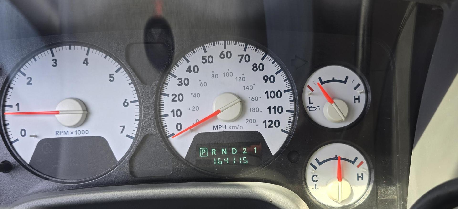 2006 Blue /Gray Dodge Ram 1500 SLT Quad Cab 4WD (1D7HU18246S) with an 5.7L V8 OHV 16V engine, 5-Speed Automatic Overdrive transmission, located at 450 N Russell, Missoula, MT, 59801, (406) 543-6600, 46.874496, -114.017433 - Beautiful 4WD Dodge with 5.7L Hemi. Automatic Transmission. Air. Cruise. Tilt. Hefty Grill Guard. AM FM CD Player. Power Drivers Seat. Power Windows and Locks. Towing. Nice Wheels and Tires. We Finance through local Credit Unions. We do NOT offer In House (Buy Here Pay Here) Financing. - Photo#15