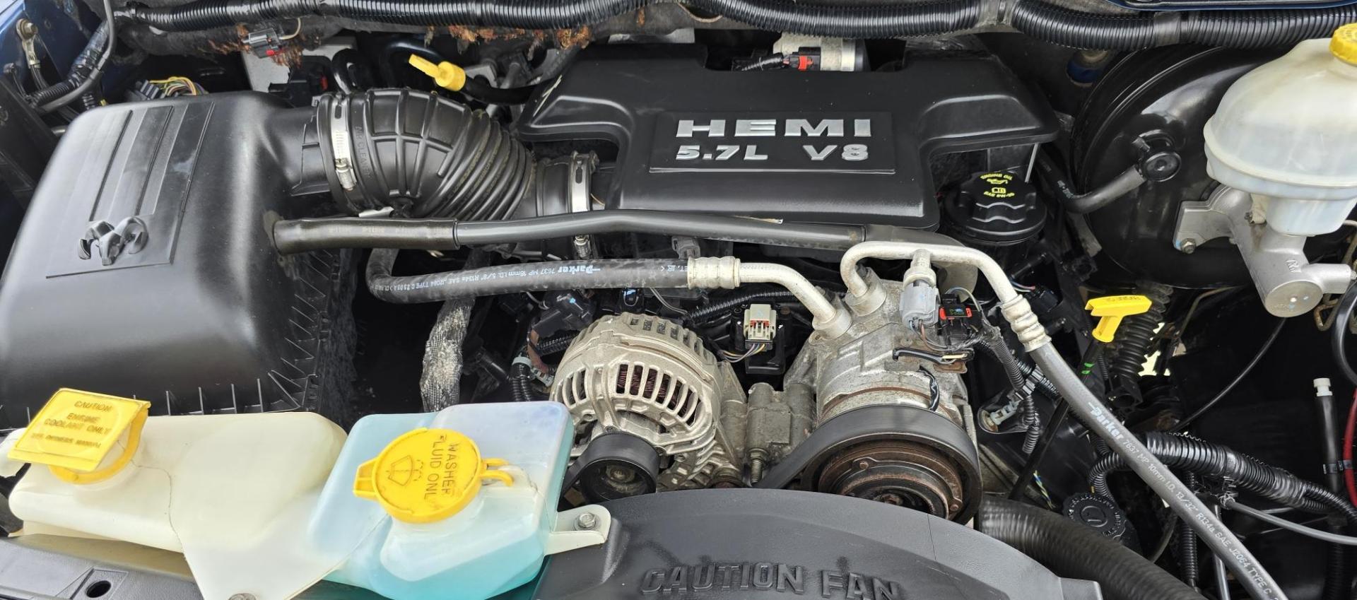 2006 Blue /Gray Dodge Ram 1500 SLT Quad Cab 4WD (1D7HU18246S) with an 5.7L V8 OHV 16V engine, 5-Speed Automatic Overdrive transmission, located at 450 N Russell, Missoula, MT, 59801, (406) 543-6600, 46.874496, -114.017433 - Beautiful 4WD Dodge with 5.7L Hemi. Automatic Transmission. Air. Cruise. Tilt. Hefty Grill Guard. AM FM CD Player. Power Drivers Seat. Power Windows and Locks. Towing. Nice Wheels and Tires. We Finance through local Credit Unions. We do NOT offer In House (Buy Here Pay Here) Financing. - Photo#16