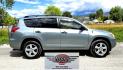 2006 Green /Gray Toyota RAV4 Base I4 4WD (JTMBD35VX65) with an 2.4L L4 DOHC 16V engine, 4-Speed Automatic transmission, located at 450 N Russell, Missoula, MT, 59801, (406) 543-6600, 46.874496, -114.017433 - Clean Little AWD SUV. 3rd Row Seating. 2.4L I4 Engine. Automatic Transmission. Air. Cruise. Tilt. AM FM CD Player. Power Windows and Locks. Clean Title and Carfax. We Finance through local Credit Unions. We do NOT offer In House (Buy Here Pay Here) Financing - Photo#1