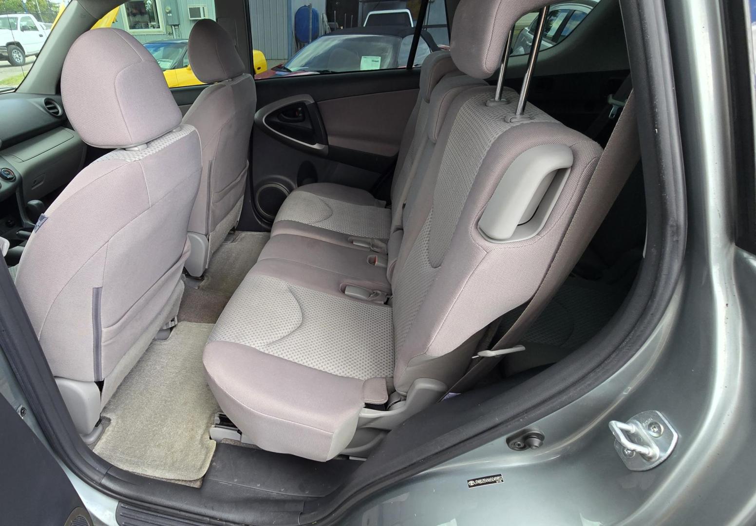 2006 Green /Gray Toyota RAV4 Base I4 4WD (JTMBD35VX65) with an 2.4L L4 DOHC 16V engine, 4-Speed Automatic transmission, located at 450 N Russell, Missoula, MT, 59801, (406) 543-6600, 46.874496, -114.017433 - Clean Little AWD SUV. 3rd Row Seating. 2.4L I4 Engine. Automatic Transmission. Air. Cruise. Tilt. AM FM CD Player. Power Windows and Locks. Clean Title and Carfax. We Finance through local Credit Unions. We do NOT offer In House (Buy Here Pay Here) Financing - Photo#14