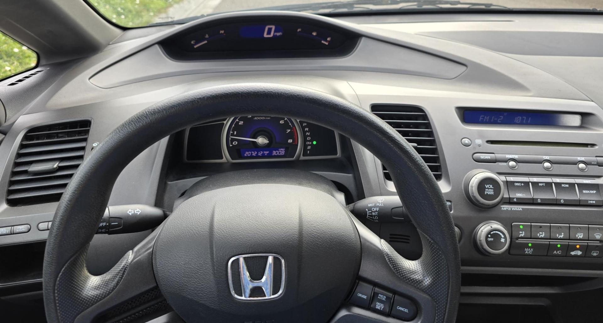 2008 Silver /Gray Honda Civic LX Sedan AT (2HGFA16558H) with an 1.8L L4 SOHC 16V engine, 5-Speed Automatic Overdrive transmission, located at 450 N Russell, Missoula, MT, 59801, (406) 543-6600, 46.874496, -114.017433 - Photo#9