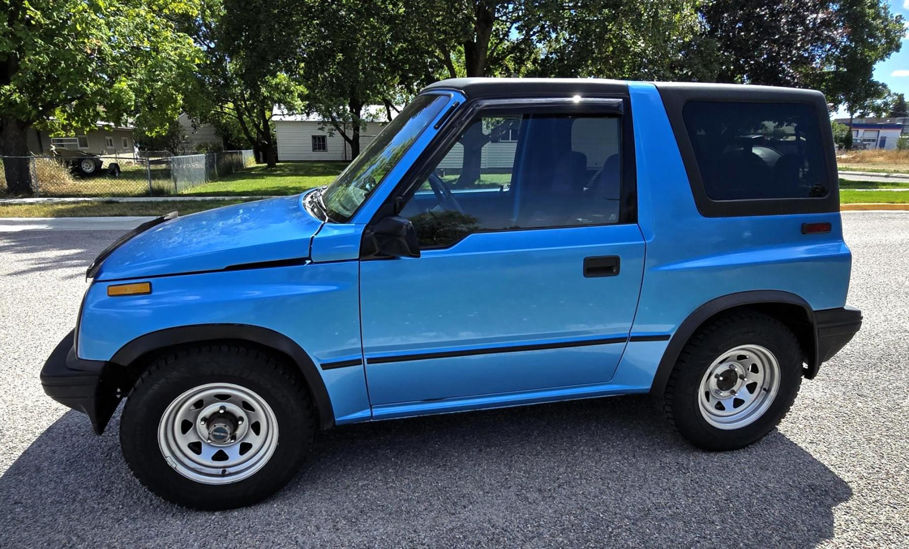 1995 Blue /Blue Geo Tracker 2-Door 4WD (2CNBJ186XS6) with an 1.6L L4 SOHC 16V engine, located at 450 N Russell, Missoula, MT, 59801, (406) 543-6600, 46.874496, -114.017433 - Cute as a Bug. 4WD GEO Tracker. Impossible to find in this condition. 1.6L I4 Engine. 5 Speed Manual Transmission. Locking Hubs. Tops come off for those hot days in the Mountains. Comes with an extra set of tires and wheels. Try to find another Tracker as nice as this for this price. Because of - Photo#6