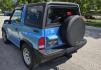 1995 Blue /Blue Geo Tracker 2-Door 4WD (2CNBJ186XS6) with an 1.6L L4 SOHC 16V engine, located at 450 N Russell, Missoula, MT, 59801, (406) 543-6600, 46.874496, -114.017433 - Cute as a Bug. 4WD GEO Tracker. Impossible to find in this condition. 1.6L I4 Engine. 5 Speed Manual Transmission. Locking Hubs. Tops come off for those hot days in the Mountains. Comes with an extra set of tires and wheels. Try to find another Tracker as nice as this for this price. Because of - Photo#7
