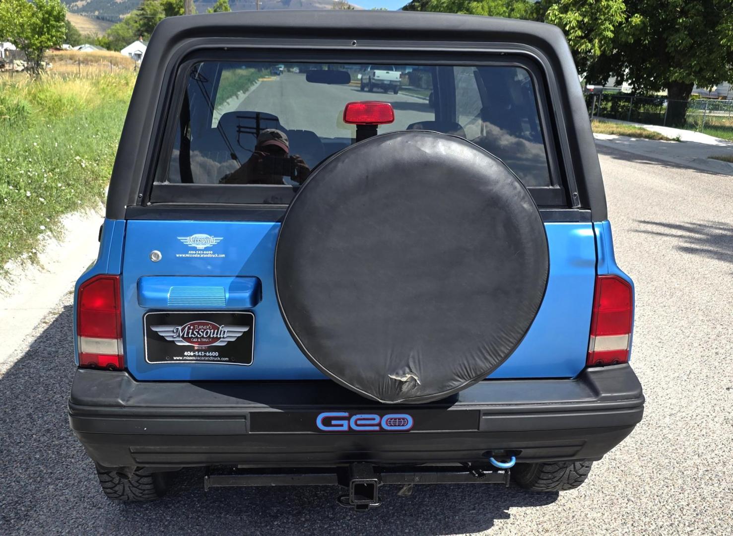 1995 Blue /Blue Geo Tracker 2-Door 4WD (2CNBJ186XS6) with an 1.6L L4 SOHC 16V engine, located at 450 N Russell, Missoula, MT, 59801, (406) 543-6600, 46.874496, -114.017433 - Cute as a Bug. 4WD GEO Tracker. Impossible to find in this condition. 1.6L I4 Engine. 5 Speed Manual Transmission. Locking Hubs. Tops come off for those hot days in the Mountains. Comes with an extra set of tires and wheels. Try to find another Tracker as nice as this for this price. Because of - Photo#9