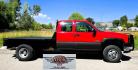 2004 Red /Gray Chevrolet Silverado 3500 Ext. Cab 4WD (1GCJK392X4E) with an 6.6L V8 OHV 32V TURBO DIESEL engine, 6 Speed Manual transmission, located at 450 N Russell, Missoula, MT, 59801, (406) 543-6600, 46.874496, -114.017433 - The Ultimate Unicorn of Chevy Trucks. One Ton Dually, Flatbed, 6.6L Duramax Diesel with a 6 Speed Manual Transmission. And Only 129K Miles! Tires are like New. Air. Cruise. Tilt. Power Windows and Locks. AM FM CD Player, Brush Guard. Headache Rack. Because of the age of this Vehicle, our lenders - Photo#1