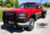 2004 Red /Gray Chevrolet Silverado 3500 Ext. Cab 4WD (1GCJK392X4E) with an 6.6L V8 OHV 32V TURBO DIESEL engine, 6 Speed Manual transmission, located at 450 N Russell, Missoula, MT, 59801, (406) 543-6600, 46.874496, -114.017433 - The Ultimate Unicorn of Chevy Trucks. One Ton Dually, Flatbed, 6.6L Duramax Diesel with a 6 Speed Manual Transmission. And Only 129K Miles! Tires are like New. Air. Cruise. Tilt. Power Windows and Locks. AM FM CD Player, Brush Guard. Headache Rack. Because of the age of this Vehicle, our lenders - Photo#6