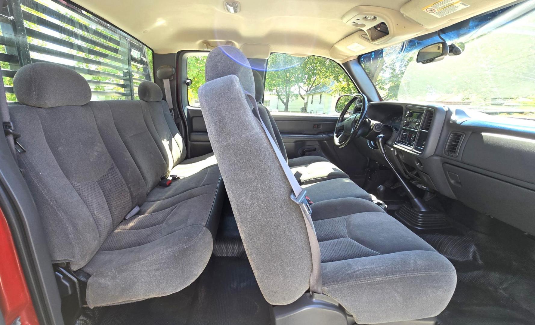 2004 Red /Gray Chevrolet Silverado 3500 Ext. Cab 4WD (1GCJK392X4E) with an 6.6L V8 OHV 32V TURBO DIESEL engine, 6 Speed Manual transmission, located at 450 N Russell, Missoula, MT, 59801, (406) 543-6600, 46.874496, -114.017433 - The Ultimate Unicorn of Chevy Trucks. One Ton Dually, Flatbed, 6.6L Duramax Diesel with a 6 Speed Manual Transmission. And Only 129K Miles! Tires are like New. Air. Cruise. Tilt. Power Windows and Locks. AM FM CD Player, Brush Guard. Headache Rack. Because of the age of this Vehicle, our lenders - Photo#15