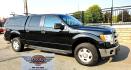 2013 Black /Gray Ford F-150 XLT SuperCrew 4WD (1FTFW1EF6DK) with an 5.0L V8 engine, 6-Speed Automatic transmission, located at 450 N Russell, Missoula, MT, 59801, (406) 543-6600, 46.874496, -114.017433 - High Miles but you wouldn't know it by how well this girl runs. 5.0L V8 Engine. 4WD.. Nice Matching Topper with Racks on top for your canoe. Air. Cruise. Tilt. Power Windows and Locks. Bluetooth Audio and Phone. AM FM XM CD Player. Power Drivers Seat. Excellent Fuel Economy for a V8 Engine. Running - Photo#5