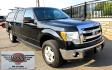 2013 Black /Gray Ford F-150 XLT SuperCrew 4WD (1FTFW1EF6DK) with an 5.0L V8 engine, 6-Speed Automatic transmission, located at 450 N Russell, Missoula, MT, 59801, (406) 543-6600, 46.874496, -114.017433 - High Miles but you wouldn't know it by how well this girl runs. 5.0L V8 Engine. 4WD.. Nice Matching Topper with Racks on top for your canoe. Air. Cruise. Tilt. Power Windows and Locks. Bluetooth Audio and Phone. AM FM XM CD Player. Power Drivers Seat. Excellent Fuel Economy for a V8 Engine. Running - Photo#6
