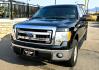 2013 Black /Gray Ford F-150 XLT SuperCrew 4WD (1FTFW1EF6DK) with an 5.0L V8 engine, 6-Speed Automatic transmission, located at 450 N Russell, Missoula, MT, 59801, (406) 543-6600, 46.874496, -114.017433 - High Miles but you wouldn't know it by how well this girl runs. 5.0L V8 Engine. 4WD.. Nice Matching Topper with Racks on top for your canoe. Air. Cruise. Tilt. Power Windows and Locks. Bluetooth Audio and Phone. AM FM XM CD Player. Power Drivers Seat. Excellent Fuel Economy for a V8 Engine. Running - Photo#8