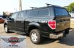 2013 Black /Gray Ford F-150 XLT SuperCrew 4WD (1FTFW1EF6DK) with an 5.0L V8 engine, 6-Speed Automatic transmission, located at 450 N Russell, Missoula, MT, 59801, (406) 543-6600, 46.874496, -114.017433 - High Miles but you wouldn't know it by how well this girl runs. 5.0L V8 Engine. 4WD.. Nice Matching Topper with Racks on top for your canoe. Air. Cruise. Tilt. Power Windows and Locks. Bluetooth Audio and Phone. AM FM XM CD Player. Power Drivers Seat. Excellent Fuel Economy for a V8 Engine. Running - Photo#9