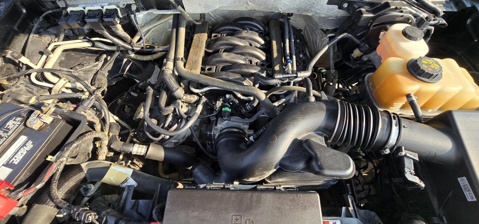 2013 Black /Gray Ford F-150 XLT SuperCrew 4WD (1FTFW1EF6DK) with an 5.0L V8 engine, 6-Speed Automatic transmission, located at 450 N Russell, Missoula, MT, 59801, (406) 543-6600, 46.874496, -114.017433 - High Miles but you wouldn't know it by how well this girl runs. 5.0L V8 Engine. 4WD.. Nice Matching Topper with Racks on top for your canoe. Air. Cruise. Tilt. Power Windows and Locks. Bluetooth Audio and Phone. AM FM XM CD Player. Power Drivers Seat. Excellent Fuel Economy for a V8 Engine. Running - Photo#19