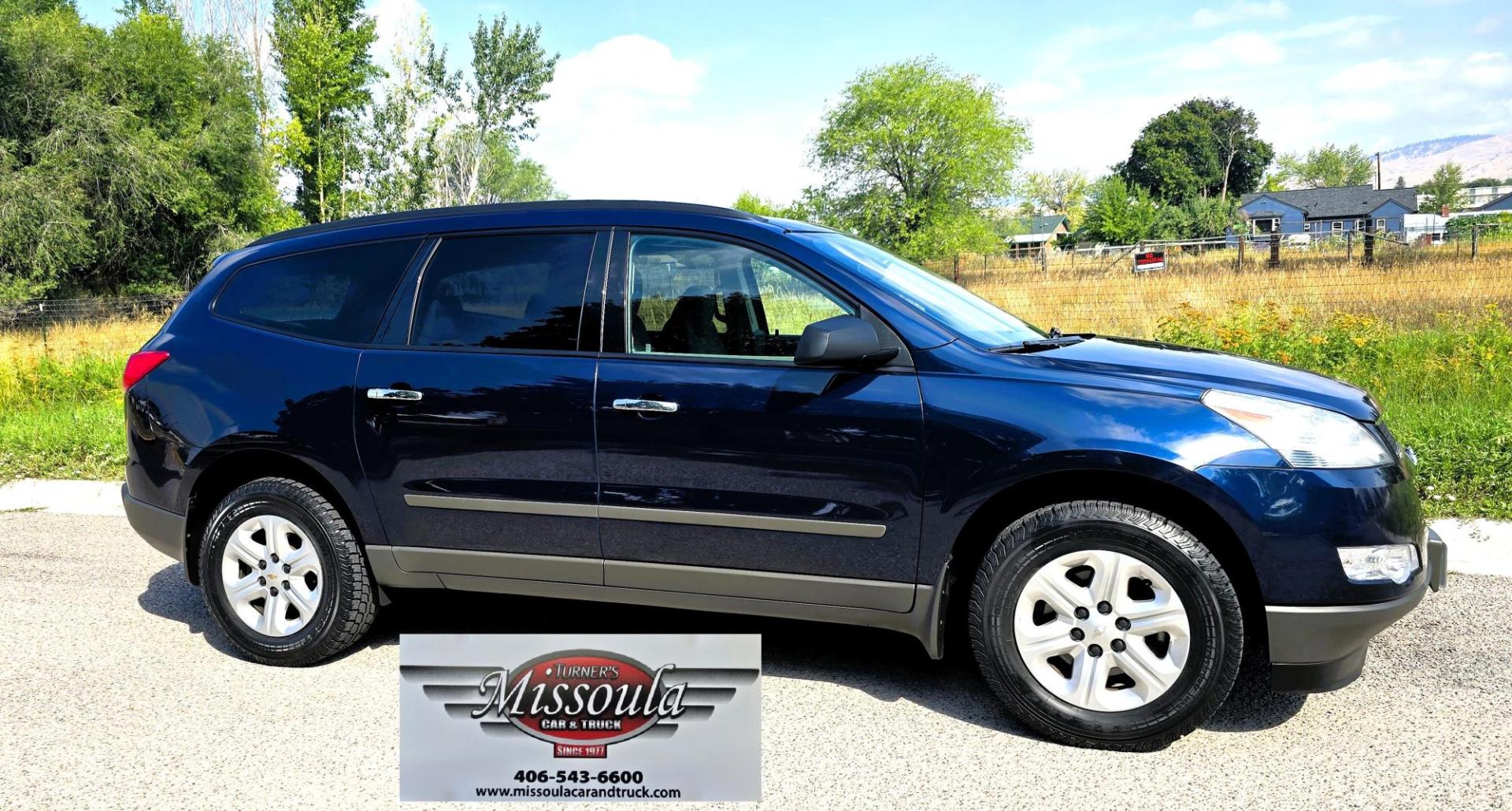 2010 Blue /Gray Chevrolet Traverse LS AWD (1GNLVEED2AJ) with an 3.6L V6 DOHC 24V engine, 6-Speed Automatic transmission, located at 450 N Russell, Missoula, MT, 59801, (406) 543-6600, 46.874496, -114.017433 - Clean 2 Owner AWD SUV with under 100K Miles. 3.6L V6 Engine. Power Drivers Seat. 3rd Row Seating. Air. Cruise. Tilt. Power Windows and Locks. AM FM CD Player. Bluetooth Audio and Phone. Clean Title and Carfax. - Photo#1