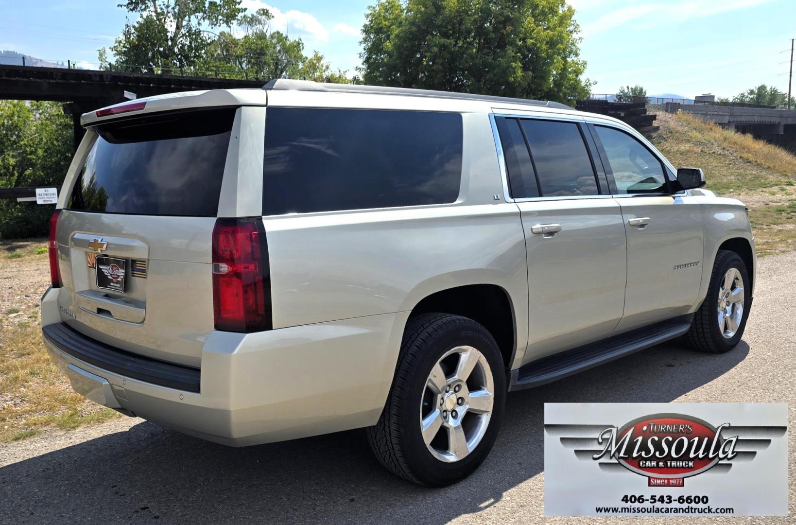 2016 Gold /Tan Chevrolet Suburban LT 4WD (1GNSKHKC4GR) with an 5.3L V8 OHV 16V engine, 6A transmission, located at 450 N Russell, Missoula, MT, 59801, (406) 543-6600, 46.874496, -114.017433 - Photo#3