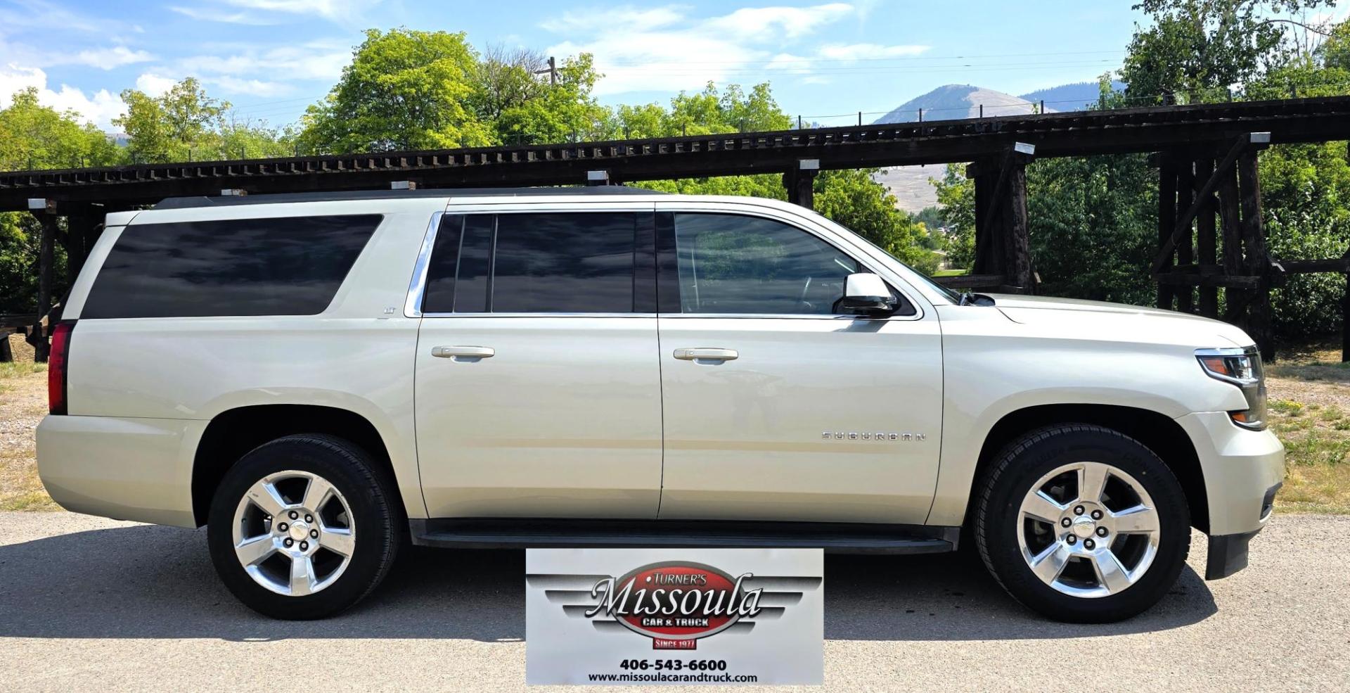 2016 Gold /Tan Chevrolet Suburban LT 4WD (1GNSKHKC4GR) with an 5.3L V8 OHV 16V engine, 6A transmission, located at 450 N Russell, Missoula, MT, 59801, (406) 543-6600, 46.874496, -114.017433 - Photo#2
