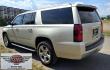 2016 Gold /Tan Chevrolet Suburban LT 4WD (1GNSKHKC4GR) with an 5.3L V8 OHV 16V engine, 6A transmission, located at 450 N Russell, Missoula, MT, 59801, (406) 543-6600, 46.874496, -114.017433 - Photo#6