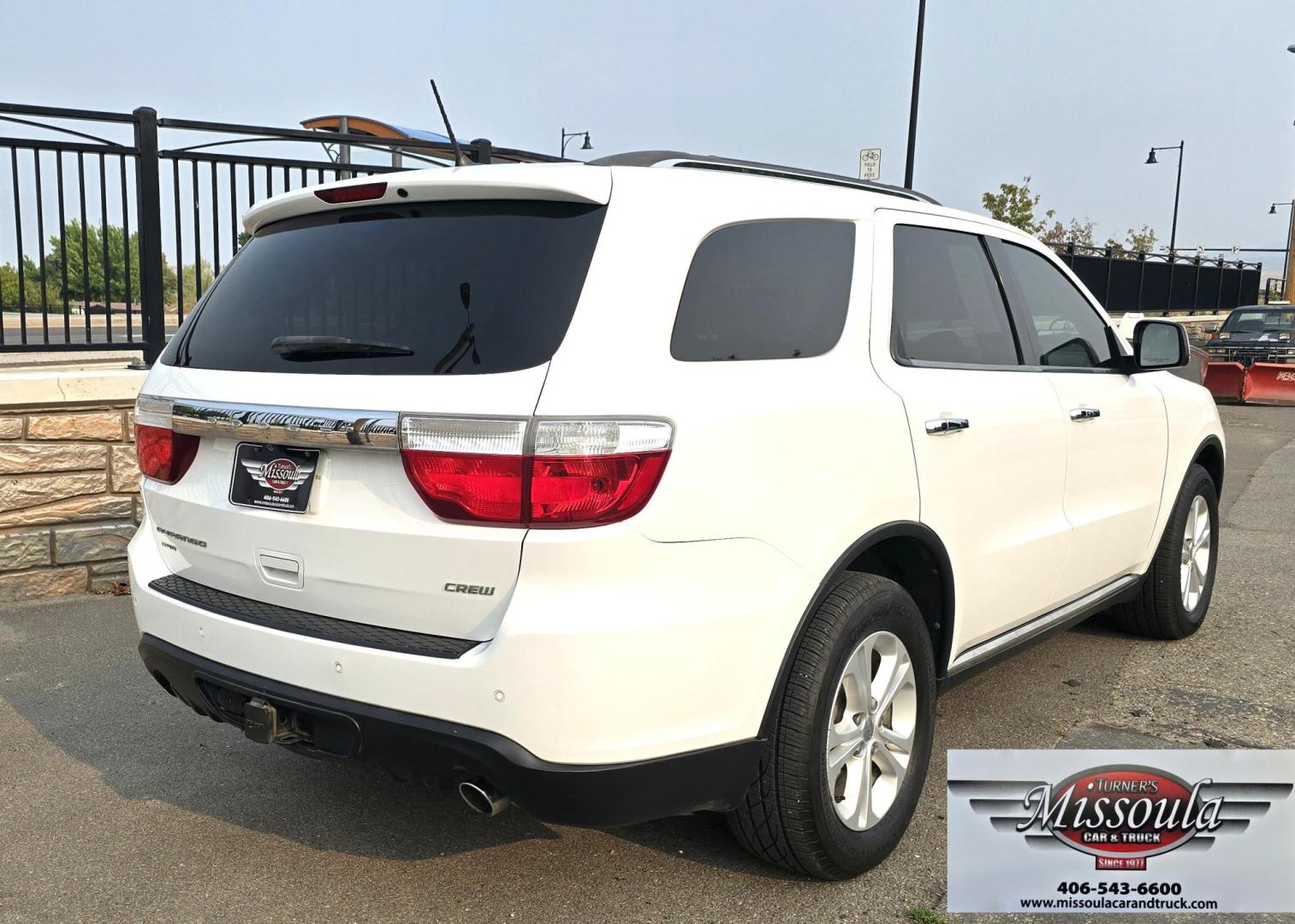 2013 White /Black Dodge Durango Crew AWD (1C4SDJDT7DC) with an 5.7L V8 OHV 16V engine, 5-Speed Automatic transmission, located at 450 N Russell, Missoula, MT, 59801, (406) 543-6600, 46.874496, -114.017433 - 5.7 Hemi Powered AWD SUV. 3rd Row Seating. Power Sunroof. Remote Start. Heated Leather Front Seats. AM FM SAT CD Player. Navigation. Bluetooth Audio and Phone. Backup Camera. Air. Cruise. Tilt. Lots of Power to Play and the Room of a Family Car. - Photo#3