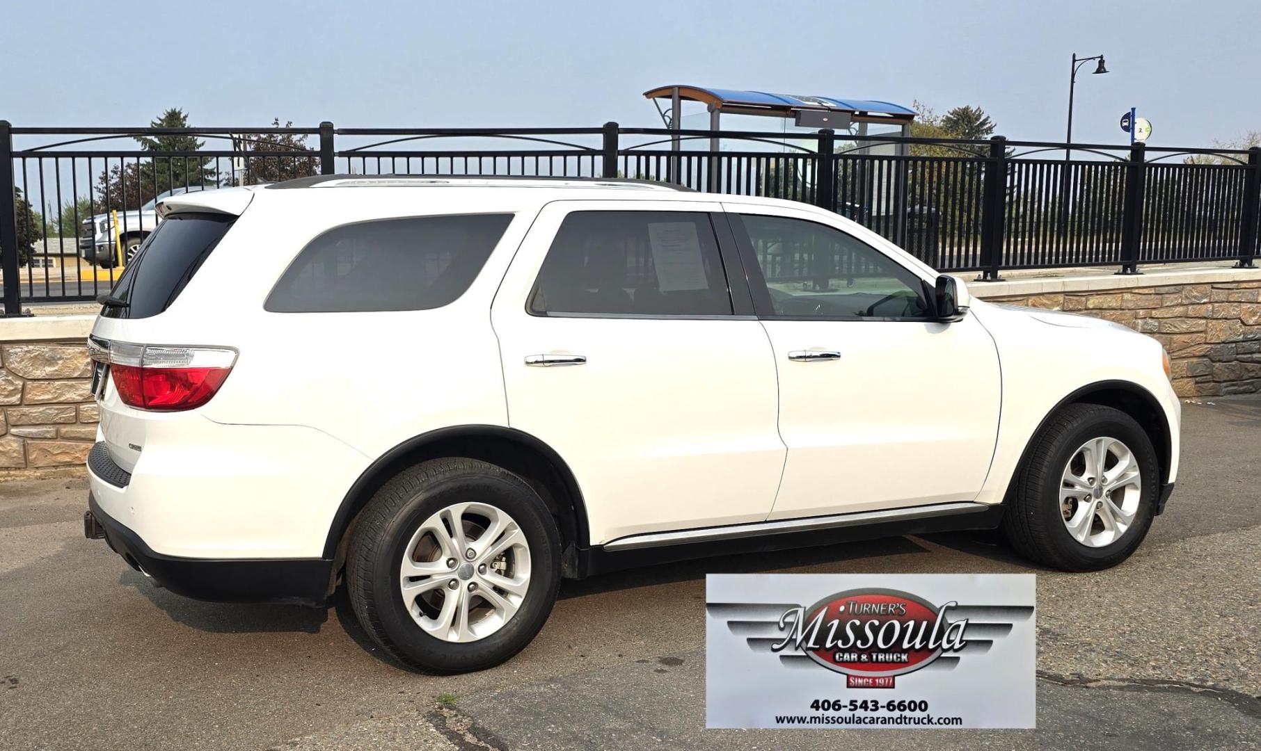 2013 White /Black Dodge Durango Crew AWD (1C4SDJDT7DC) with an 5.7L V8 OHV 16V engine, 5-Speed Automatic transmission, located at 450 N Russell, Missoula, MT, 59801, (406) 543-6600, 46.874496, -114.017433 - 5.7 Hemi Powered AWD SUV. 3rd Row Seating. Power Sunroof. Remote Start. Heated Leather Front Seats. AM FM SAT CD Player. Navigation. Bluetooth Audio and Phone. Backup Camera. Air. Cruise. Tilt. Lots of Power to Play and the Room of a Family Car. - Photo#2