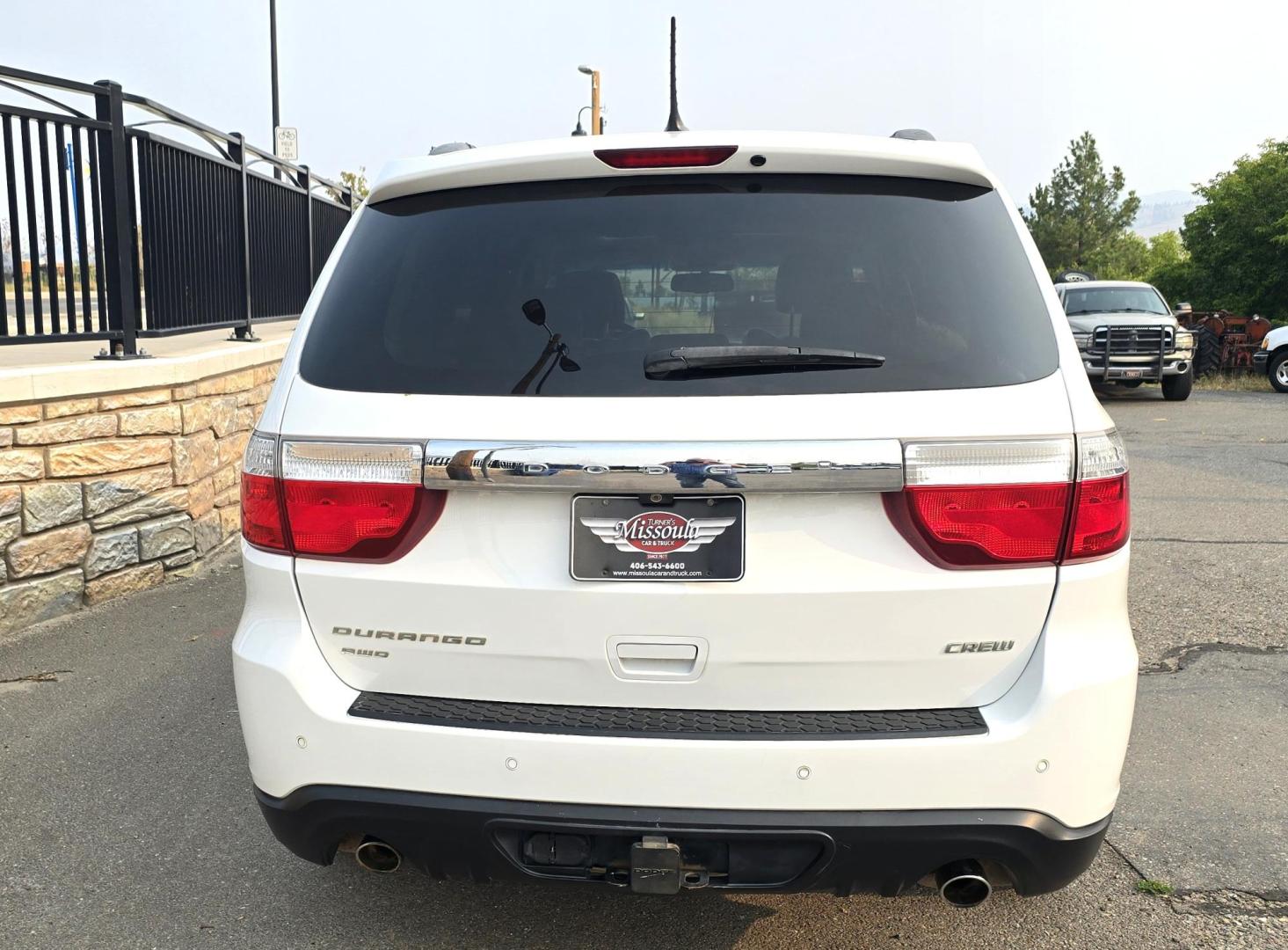2013 White /Black Dodge Durango Crew AWD (1C4SDJDT7DC) with an 5.7L V8 OHV 16V engine, 5-Speed Automatic transmission, located at 450 N Russell, Missoula, MT, 59801, (406) 543-6600, 46.874496, -114.017433 - 5.7 Hemi Powered AWD SUV. 3rd Row Seating. Power Sunroof. Remote Start. Heated Leather Front Seats. AM FM SAT CD Player. Navigation. Bluetooth Audio and Phone. Backup Camera. Air. Cruise. Tilt. Lots of Power to Play and the Room of a Family Car. - Photo#4