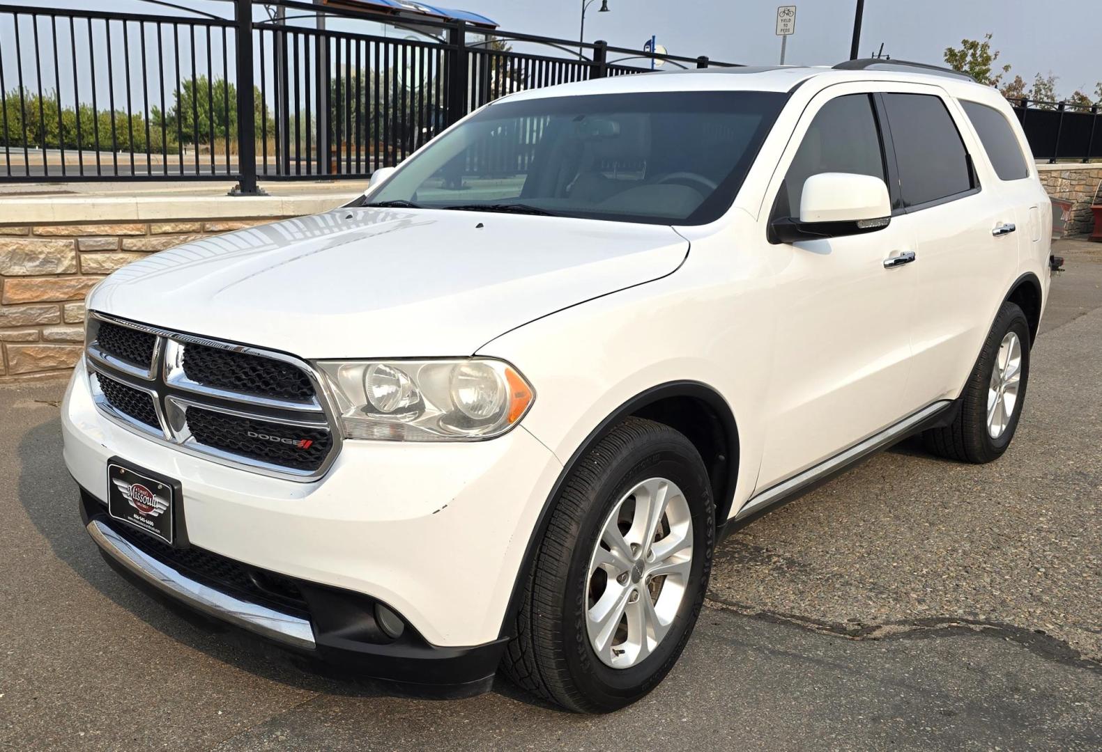 2013 White /Black Dodge Durango Crew AWD (1C4SDJDT7DC) with an 5.7L V8 OHV 16V engine, 5-Speed Automatic transmission, located at 450 N Russell, Missoula, MT, 59801, (406) 543-6600, 46.874496, -114.017433 - 5.7 Hemi Powered AWD SUV. 3rd Row Seating. Power Sunroof. Remote Start. Heated Leather Front Seats. AM FM SAT CD Player. Navigation. Bluetooth Audio and Phone. Backup Camera. Air. Cruise. Tilt. Lots of Power to Play and the Room of a Family Car. - Photo#7