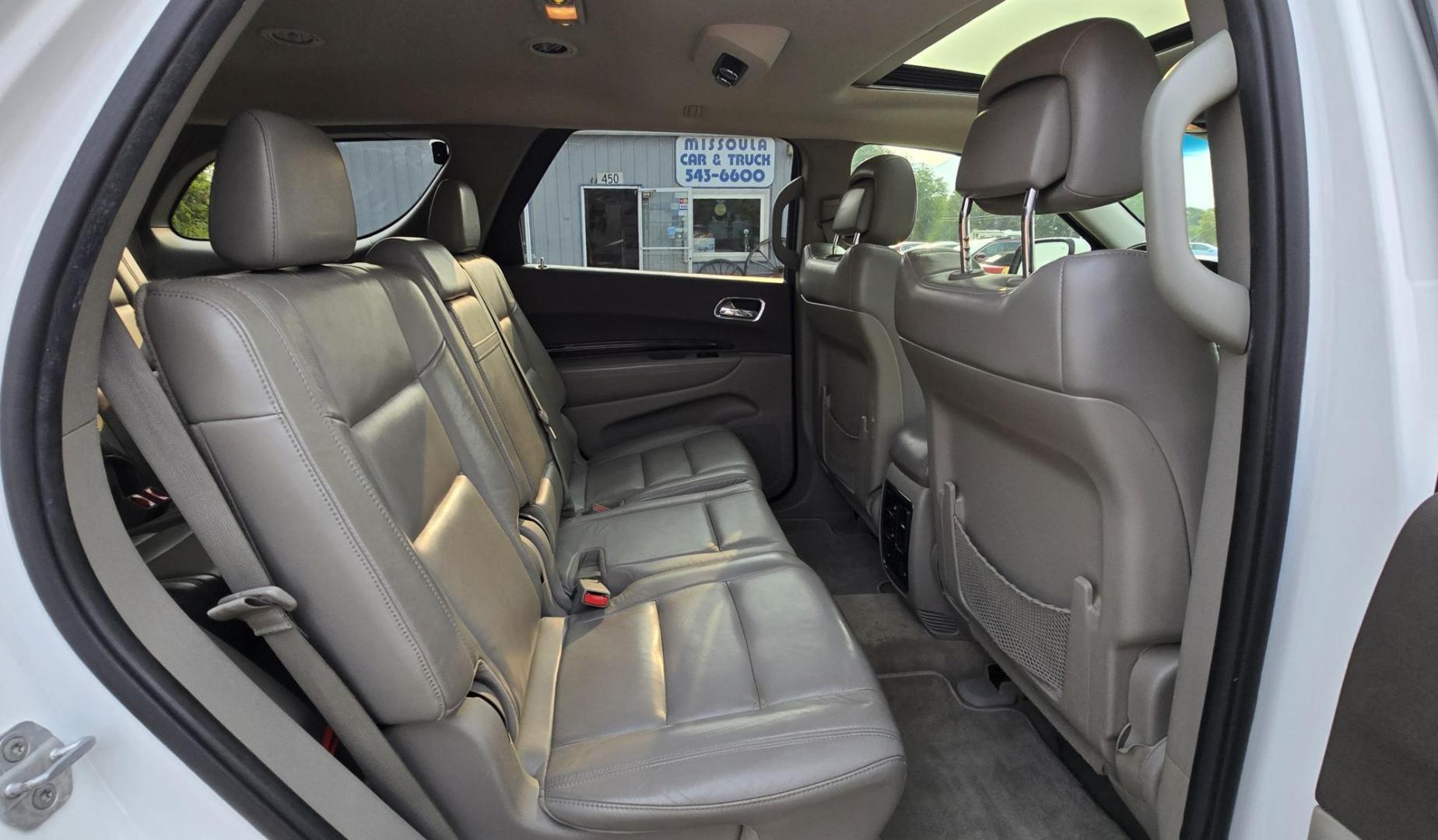 2013 White /Black Dodge Durango Crew AWD (1C4SDJDT7DC) with an 5.7L V8 OHV 16V engine, 5-Speed Automatic transmission, located at 450 N Russell, Missoula, MT, 59801, (406) 543-6600, 46.874496, -114.017433 - 5.7 Hemi Powered AWD SUV. 3rd Row Seating. Power Sunroof. Remote Start. Heated Leather Front Seats. AM FM SAT CD Player. Navigation. Bluetooth Audio and Phone. Backup Camera. Air. Cruise. Tilt. Lots of Power to Play and the Room of a Family Car. - Photo#10