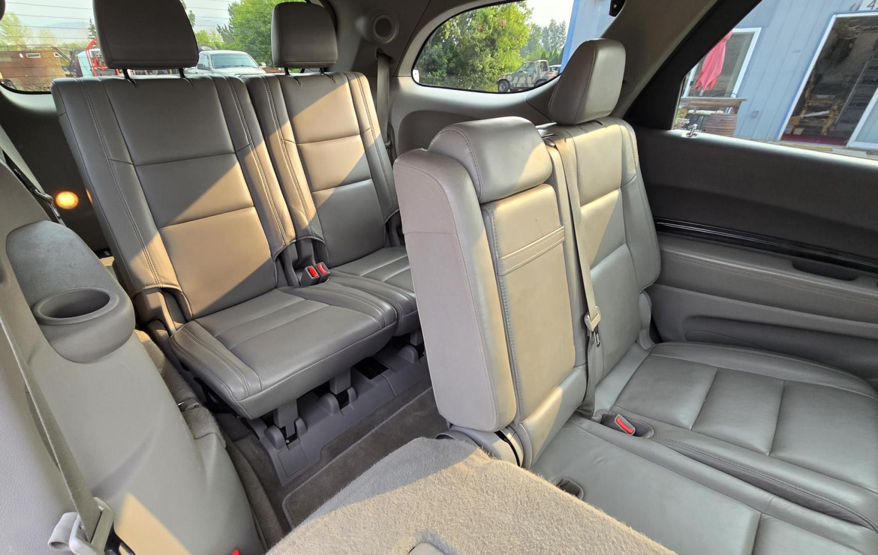 2013 White /Black Dodge Durango Crew AWD (1C4SDJDT7DC) with an 5.7L V8 OHV 16V engine, 5-Speed Automatic transmission, located at 450 N Russell, Missoula, MT, 59801, (406) 543-6600, 46.874496, -114.017433 - 5.7 Hemi Powered AWD SUV. 3rd Row Seating. Power Sunroof. Remote Start. Heated Leather Front Seats. AM FM SAT CD Player. Navigation. Bluetooth Audio and Phone. Backup Camera. Air. Cruise. Tilt. Lots of Power to Play and the Room of a Family Car. - Photo#12