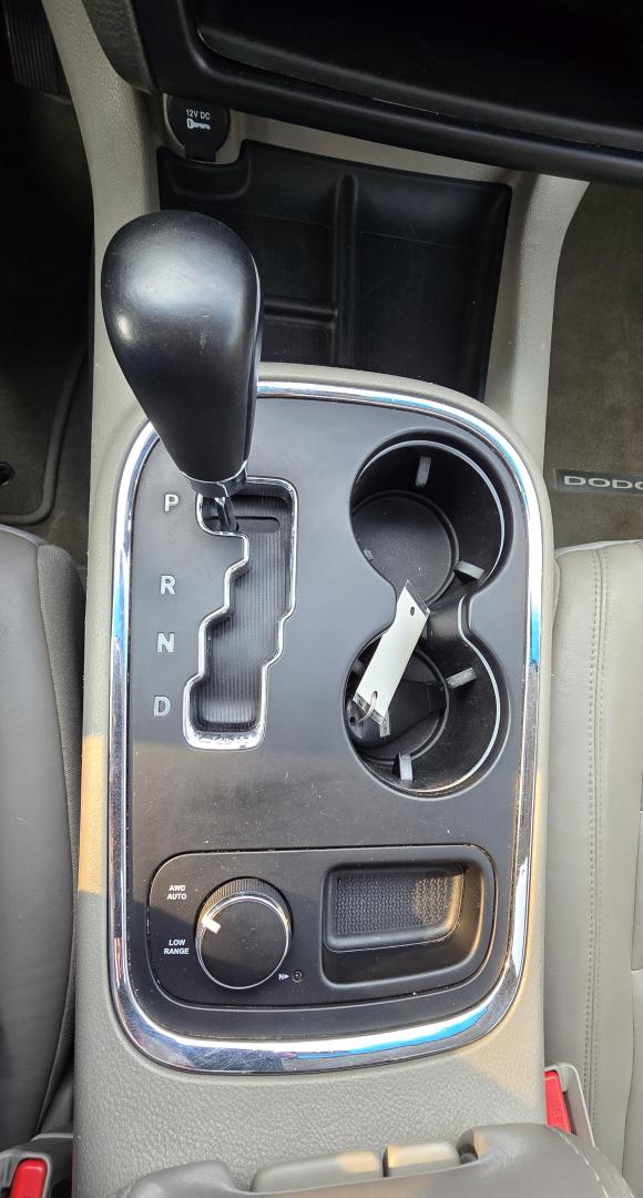 2013 White /Black Dodge Durango Crew AWD (1C4SDJDT7DC) with an 5.7L V8 OHV 16V engine, 5-Speed Automatic transmission, located at 450 N Russell, Missoula, MT, 59801, (406) 543-6600, 46.874496, -114.017433 - 5.7 Hemi Powered AWD SUV. 3rd Row Seating. Power Sunroof. Remote Start. Heated Leather Front Seats. AM FM SAT CD Player. Navigation. Bluetooth Audio and Phone. Backup Camera. Air. Cruise. Tilt. Lots of Power to Play and the Room of a Family Car. - Photo#17