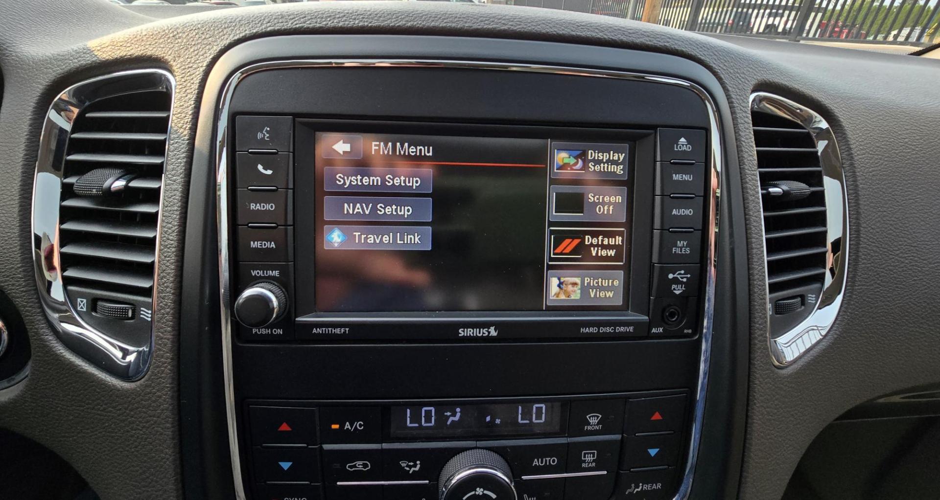 2013 White /Black Dodge Durango Crew AWD (1C4SDJDT7DC) with an 5.7L V8 OHV 16V engine, 5-Speed Automatic transmission, located at 450 N Russell, Missoula, MT, 59801, (406) 543-6600, 46.874496, -114.017433 - 5.7 Hemi Powered AWD SUV. 3rd Row Seating. Power Sunroof. Remote Start. Heated Leather Front Seats. AM FM SAT CD Player. Navigation. Bluetooth Audio and Phone. Backup Camera. Air. Cruise. Tilt. Lots of Power to Play and the Room of a Family Car. - Photo#16