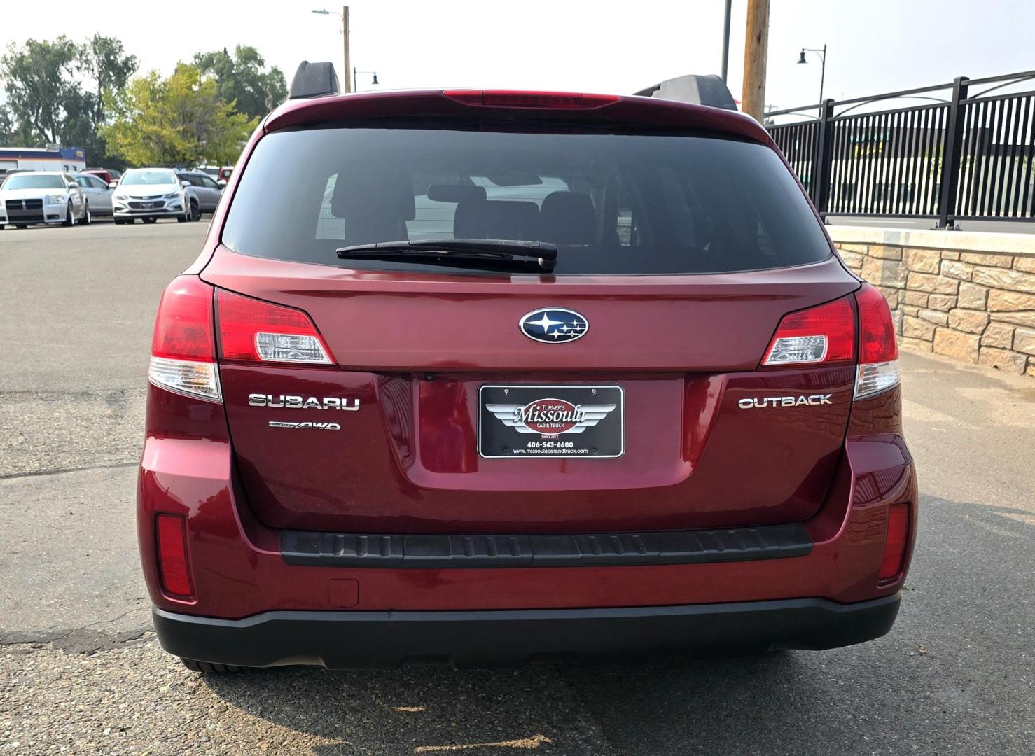 2012 Burgundy /Gray Subaru Outback 2.5i Premium (4S4BRCGC4C3) with an 2.5L H4 DOHC 16V engine, Automatic transmission, located at 450 N Russell, Missoula, MT, 59801, (406) 543-6600, 46.874496, -114.017433 - Photo#6