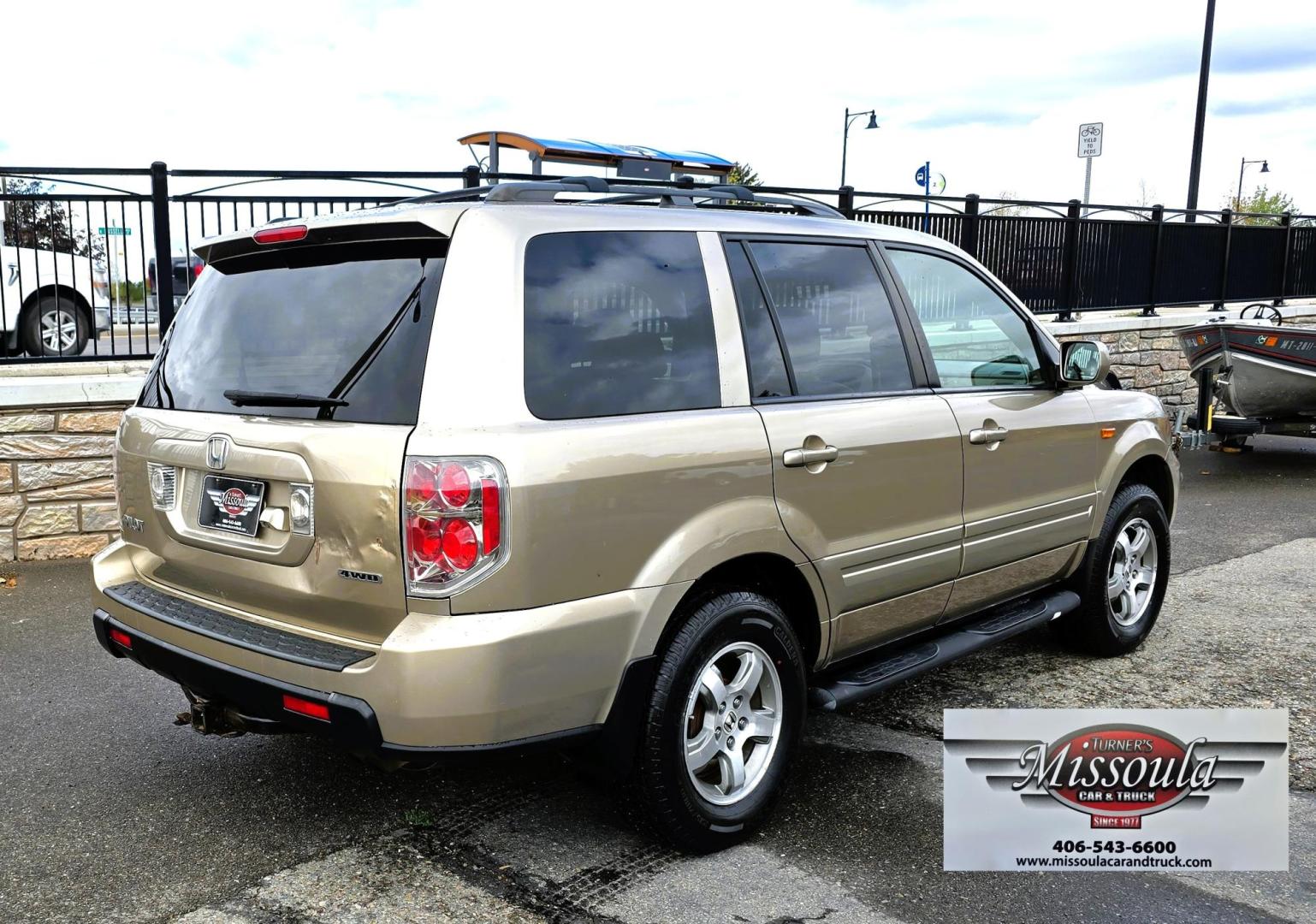 2006 Gold /Tan Honda Pilot EX 4WD w/Leather and Navigation (2HKYF18726H) with an 3.5L V6 SOHC 24V engine, 5-Speed Automatic Overdrive transmission, located at 450 N Russell, Missoula, MT, 59801, (406) 543-6600, 46.874496, -114.017433 - One Owner Honda Pilot AWD. 3.5L V6 Engine. Leather Heated Front Seats. 3rd Row Seating. Power Sun Roof. Power Windows and Locks. Air. Cruise. Tilt. Navigation. Bluetooth. Backup Camera. AM FM XM CD Changer. Timing Belt was Replaced at 120K We Finance through local Credit Unions. We do NOT off - Photo#2