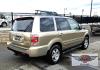 2006 Gold /Tan Honda Pilot EX 4WD w/Leather and Navigation (2HKYF18726H) with an 3.5L V6 SOHC 24V engine, 5-Speed Automatic Overdrive transmission, located at 450 N Russell, Missoula, MT, 59801, (406) 543-6600, 46.874496, -114.017433 - One Owner Honda Pilot AWD. 3.5L V6 Engine. Leather Heated Front Seats. 3rd Row Seating. Power Sun Roof. Power Windows and Locks. Air. Cruise. Tilt. Navigation. Bluetooth. Backup Camera. AM FM XM CD Changer. Timing Belt was Replaced at 120K We Finance through local Credit Unions. We do NOT off - Photo#2