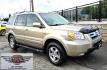 2006 Gold /Tan Honda Pilot EX 4WD w/Leather and Navigation (2HKYF18726H) with an 3.5L V6 SOHC 24V engine, 5-Speed Automatic Overdrive transmission, located at 450 N Russell, Missoula, MT, 59801, (406) 543-6600, 46.874496, -114.017433 - One Owner Honda Pilot AWD. 3.5L V6 Engine. Leather Heated Front Seats. 3rd Row Seating. Power Sun Roof. Power Windows and Locks. Air. Cruise. Tilt. Navigation. Bluetooth. Backup Camera. AM FM XM CD Changer. Timing Belt was Replaced at 120K We Finance through local Credit Unions. We do NOT off - Photo#4