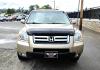 2006 Gold /Tan Honda Pilot EX 4WD w/Leather and Navigation (2HKYF18726H) with an 3.5L V6 SOHC 24V engine, 5-Speed Automatic Overdrive transmission, located at 450 N Russell, Missoula, MT, 59801, (406) 543-6600, 46.874496, -114.017433 - One Owner Honda Pilot AWD. 3.5L V6 Engine. Leather Heated Front Seats. 3rd Row Seating. Power Sun Roof. Power Windows and Locks. Air. Cruise. Tilt. Navigation. Bluetooth. Backup Camera. AM FM XM CD Changer. Timing Belt was Replaced at 120K We Finance through local Credit Unions. We do NOT off - Photo#5