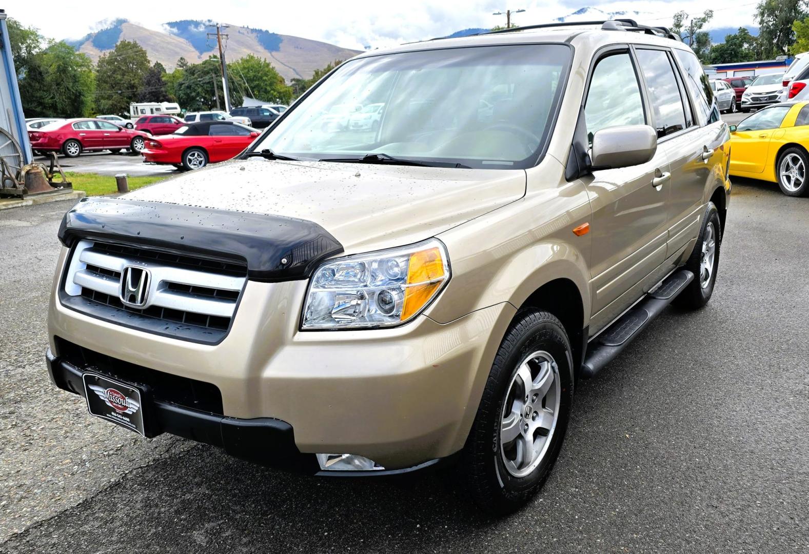 2006 Gold /Tan Honda Pilot EX 4WD w/Leather and Navigation (2HKYF18726H) with an 3.5L V6 SOHC 24V engine, 5-Speed Automatic Overdrive transmission, located at 450 N Russell, Missoula, MT, 59801, (406) 543-6600, 46.874496, -114.017433 - One Owner Honda Pilot AWD. 3.5L V6 Engine. Leather Heated Front Seats. 3rd Row Seating. Power Sun Roof. Power Windows and Locks. Air. Cruise. Tilt. Navigation. Bluetooth. Backup Camera. AM FM XM CD Changer. Timing Belt was Replaced at 120K We Finance through local Credit Unions. We do NOT off - Photo#6