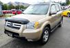 2006 Gold /Tan Honda Pilot EX 4WD w/Leather and Navigation (2HKYF18726H) with an 3.5L V6 SOHC 24V engine, 5-Speed Automatic Overdrive transmission, located at 450 N Russell, Missoula, MT, 59801, (406) 543-6600, 46.874496, -114.017433 - One Owner Honda Pilot AWD. 3.5L V6 Engine. Leather Heated Front Seats. 3rd Row Seating. Power Sun Roof. Power Windows and Locks. Air. Cruise. Tilt. Navigation. Bluetooth. Backup Camera. AM FM XM CD Changer. Timing Belt was Replaced at 120K We Finance through local Credit Unions. We do NOT off - Photo#6
