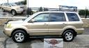 2006 Gold /Tan Honda Pilot EX 4WD w/Leather and Navigation (2HKYF18726H) with an 3.5L V6 SOHC 24V engine, 5-Speed Automatic Overdrive transmission, located at 450 N Russell, Missoula, MT, 59801, (406) 543-6600, 46.874496, -114.017433 - One Owner Honda Pilot AWD. 3.5L V6 Engine. Leather Heated Front Seats. 3rd Row Seating. Power Sun Roof. Power Windows and Locks. Air. Cruise. Tilt. Navigation. Bluetooth. Backup Camera. AM FM XM CD Changer. Timing Belt was Replaced at 120K We Finance through local Credit Unions. We do NOT off - Photo#8