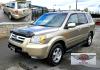 2006 Gold /Tan Honda Pilot EX 4WD w/Leather and Navigation (2HKYF18726H) with an 3.5L V6 SOHC 24V engine, 5-Speed Automatic Overdrive transmission, located at 450 N Russell, Missoula, MT, 59801, (406) 543-6600, 46.874496, -114.017433 - One Owner Honda Pilot AWD. 3.5L V6 Engine. Leather Heated Front Seats. 3rd Row Seating. Power Sun Roof. Power Windows and Locks. Air. Cruise. Tilt. Navigation. Bluetooth. Backup Camera. AM FM XM CD Changer. Timing Belt was Replaced at 120K We Finance through local Credit Unions. We do NOT off - Photo#9
