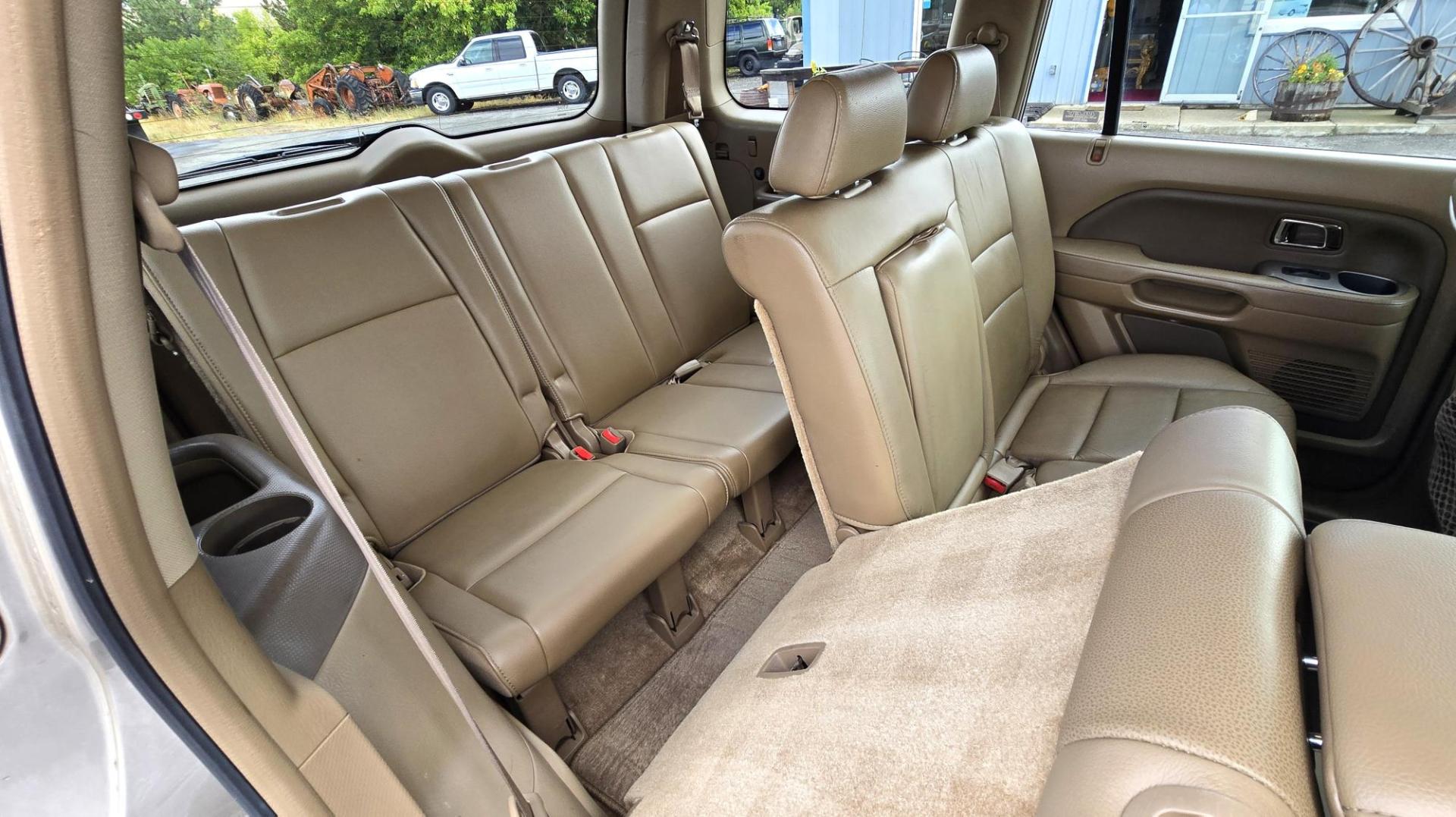 2006 Gold /Tan Honda Pilot EX 4WD w/Leather and Navigation (2HKYF18726H) with an 3.5L V6 SOHC 24V engine, 5-Speed Automatic Overdrive transmission, located at 450 N Russell, Missoula, MT, 59801, (406) 543-6600, 46.874496, -114.017433 - One Owner Honda Pilot AWD. 3.5L V6 Engine. Leather Heated Front Seats. 3rd Row Seating. Power Sun Roof. Power Windows and Locks. Air. Cruise. Tilt. Navigation. Bluetooth. Backup Camera. AM FM XM CD Changer. Timing Belt was Replaced at 120K We Finance through local Credit Unions. We do NOT off - Photo#12